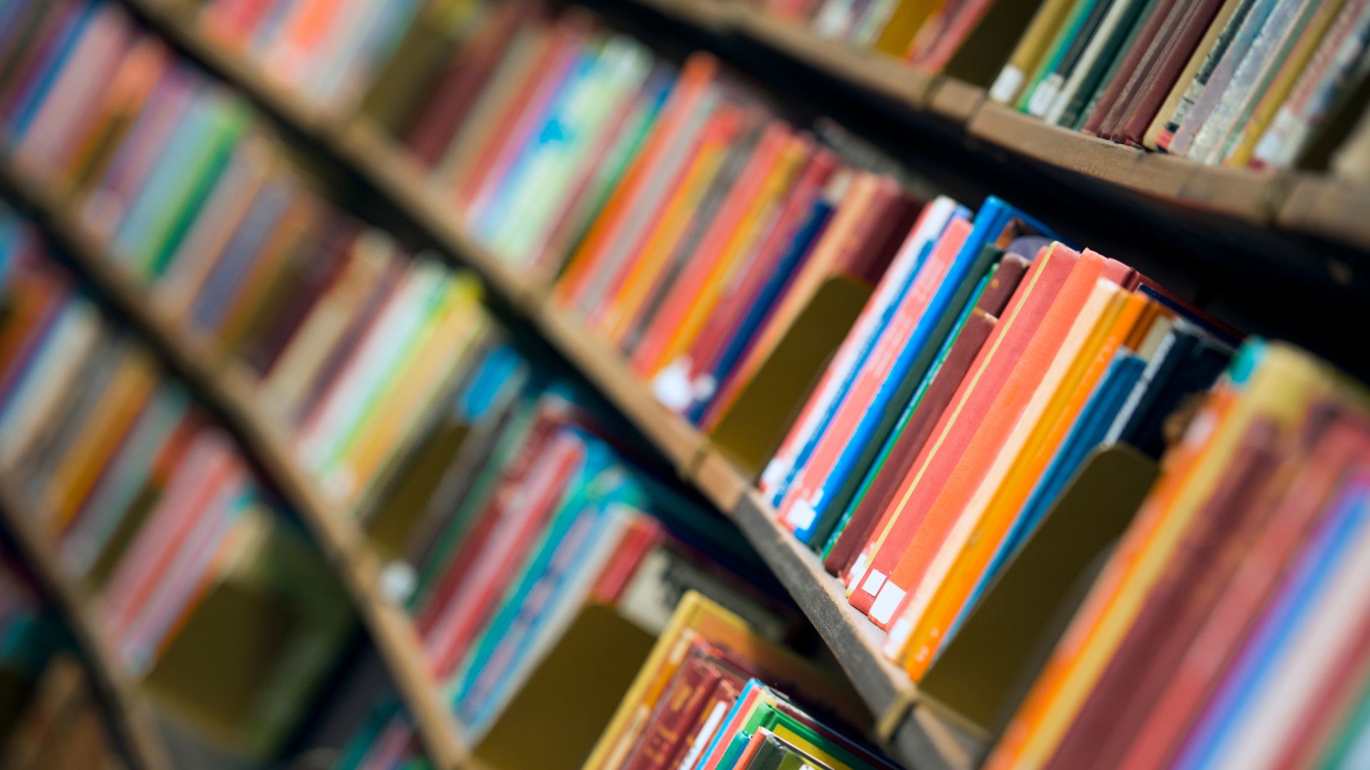 Colourful books representing long form content